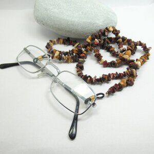 Chip strand eye glass holder